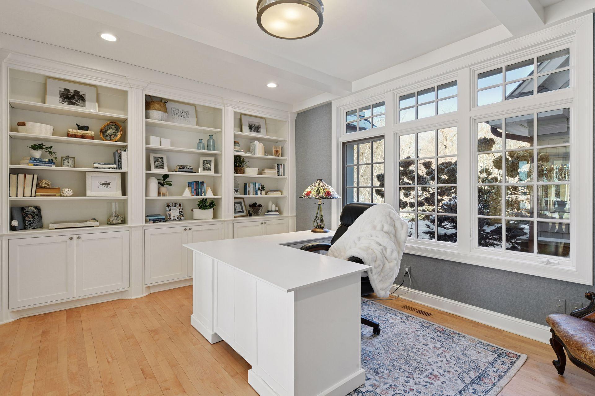 You will love working from home in the main floor office with lake views through the glass French doors.