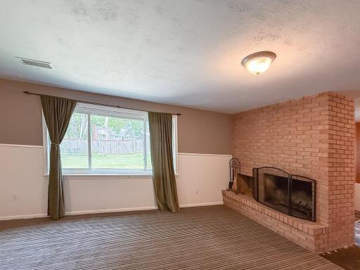 Lower level family room with fireplace