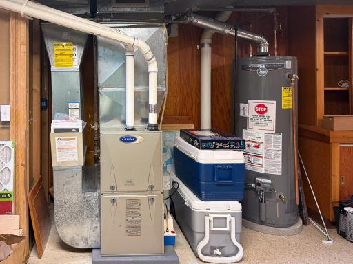 Utility room with new furnace and water heater.jpg