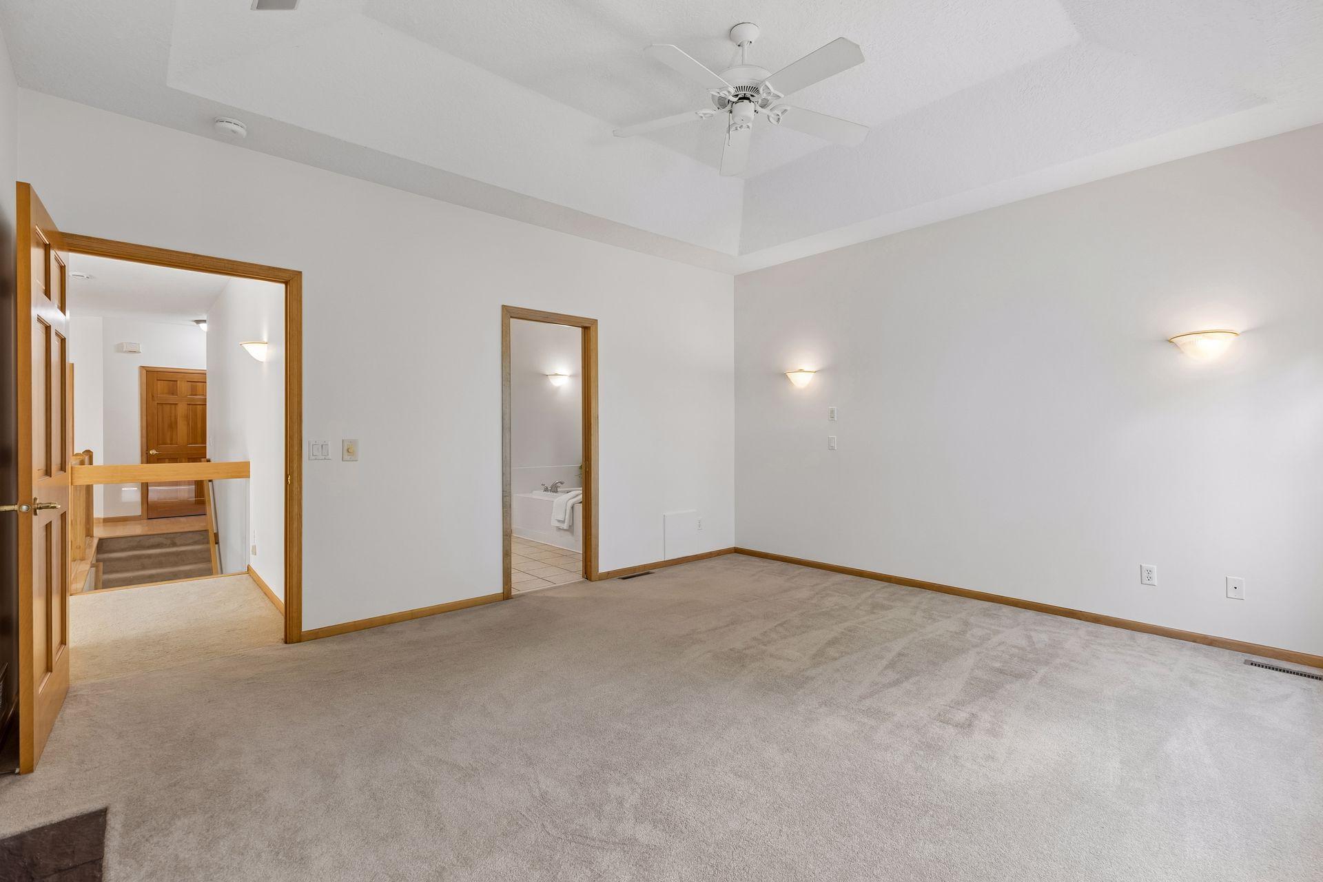Primary Bedroom into Bathroom