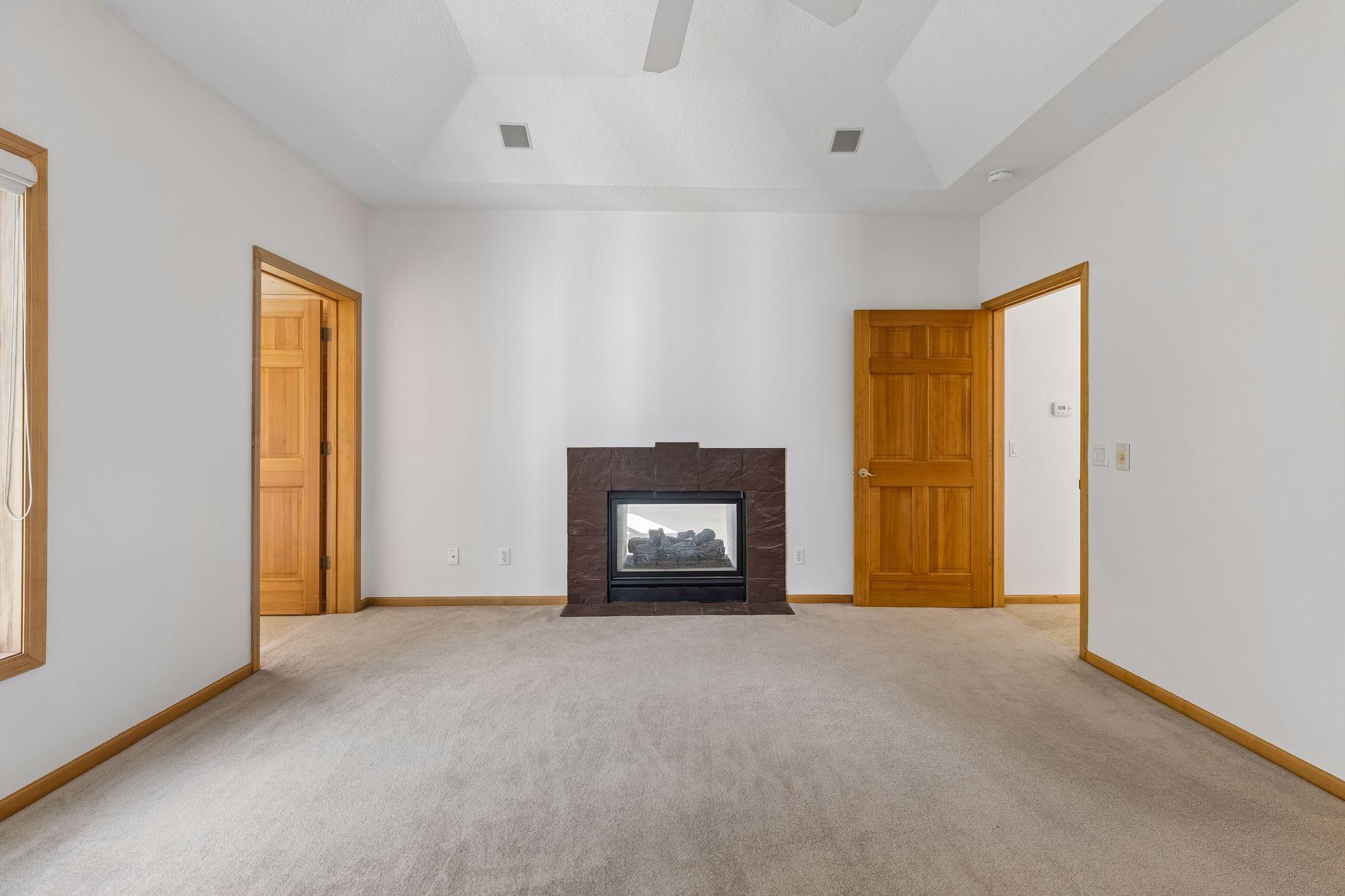 Primary Bedroom - Gas Fireplace