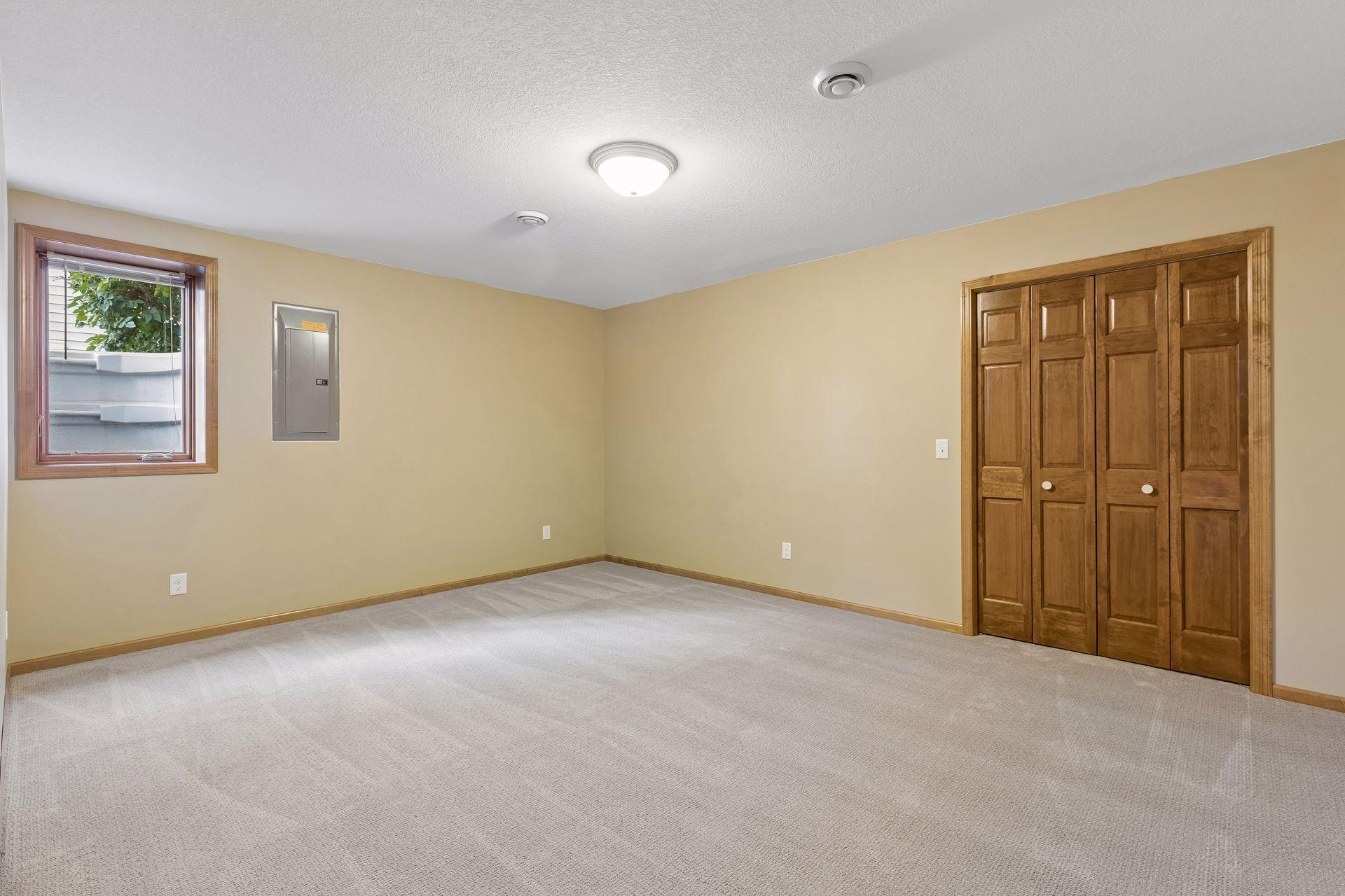 Lower Level Bedroom One with Egress Window