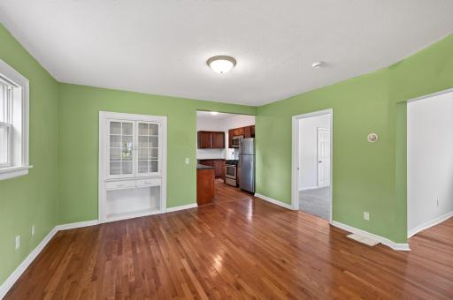 Look at those floors in this dining room!
