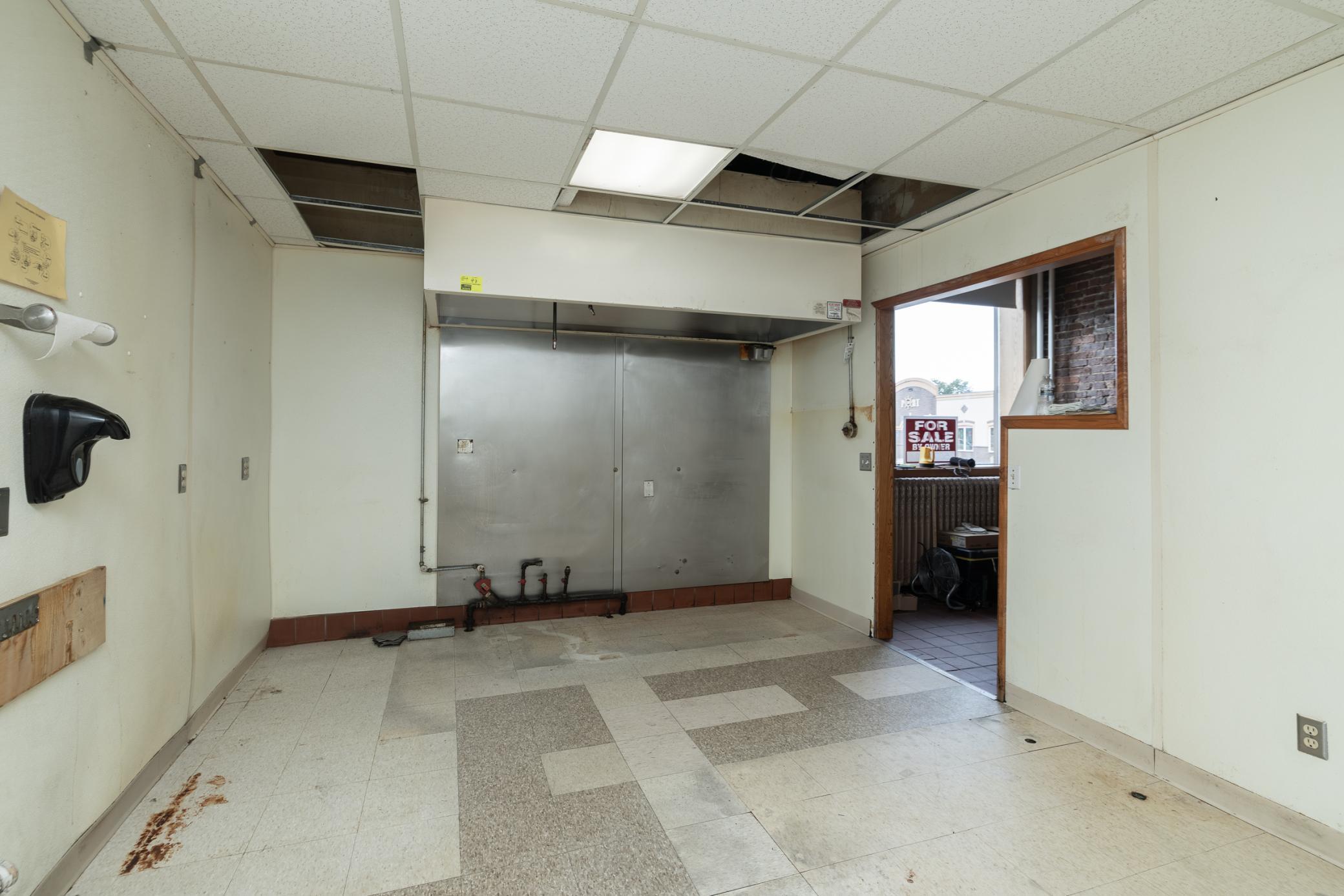 Current photo of the main floor kitchen area