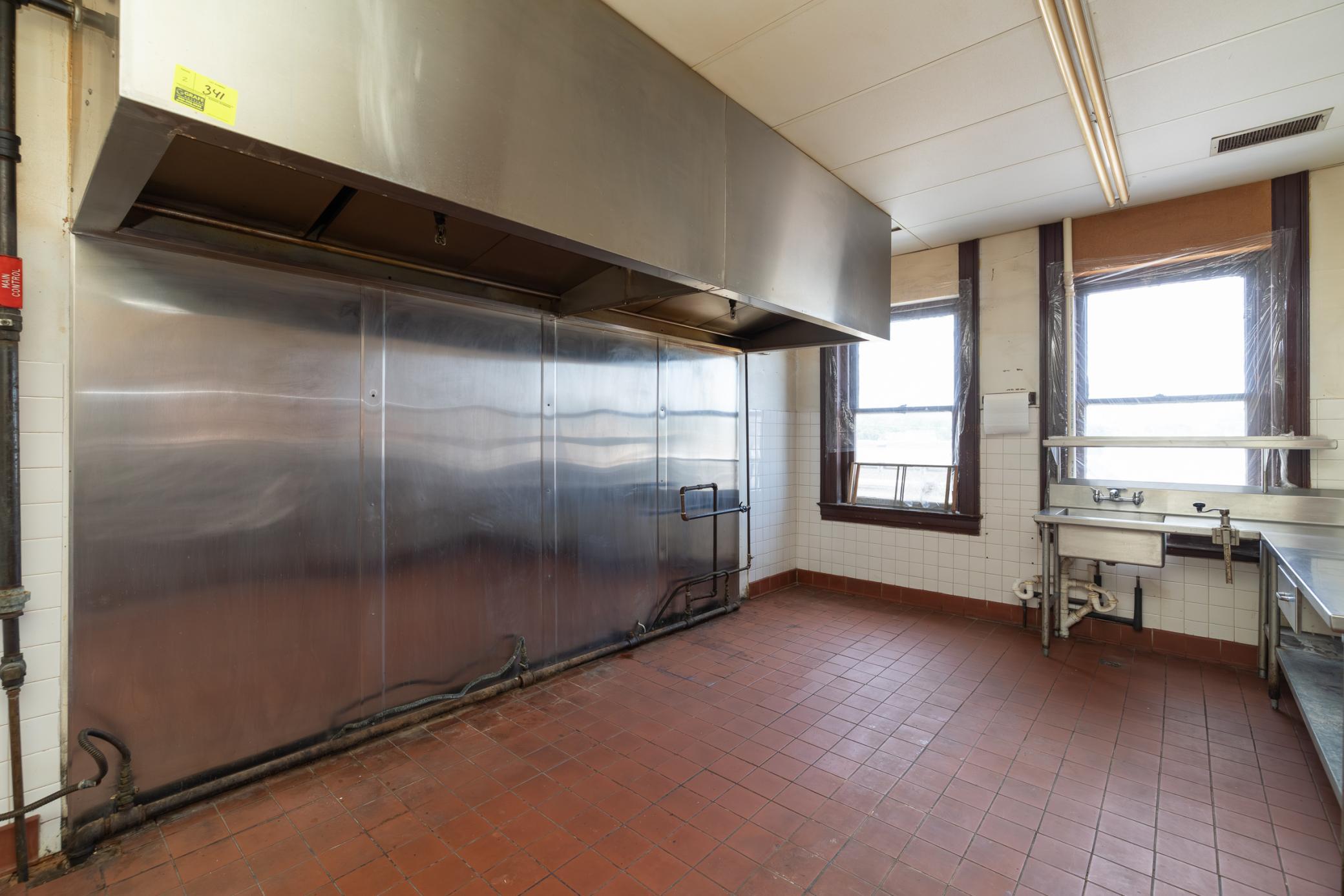 Upper level kitchen area has been cleared out