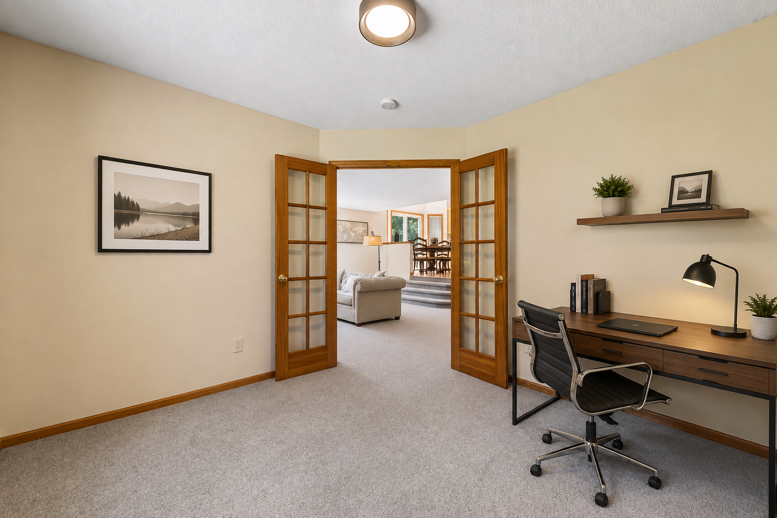 VIRTUALLY STAGED to showcase the versatility of this main-floor bedroom/office.