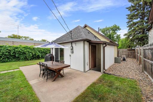 The open door leads to the lower level for laundry, utilities, and ample storage! 1404 12th Ave NE, Minneapolis, MN 55413