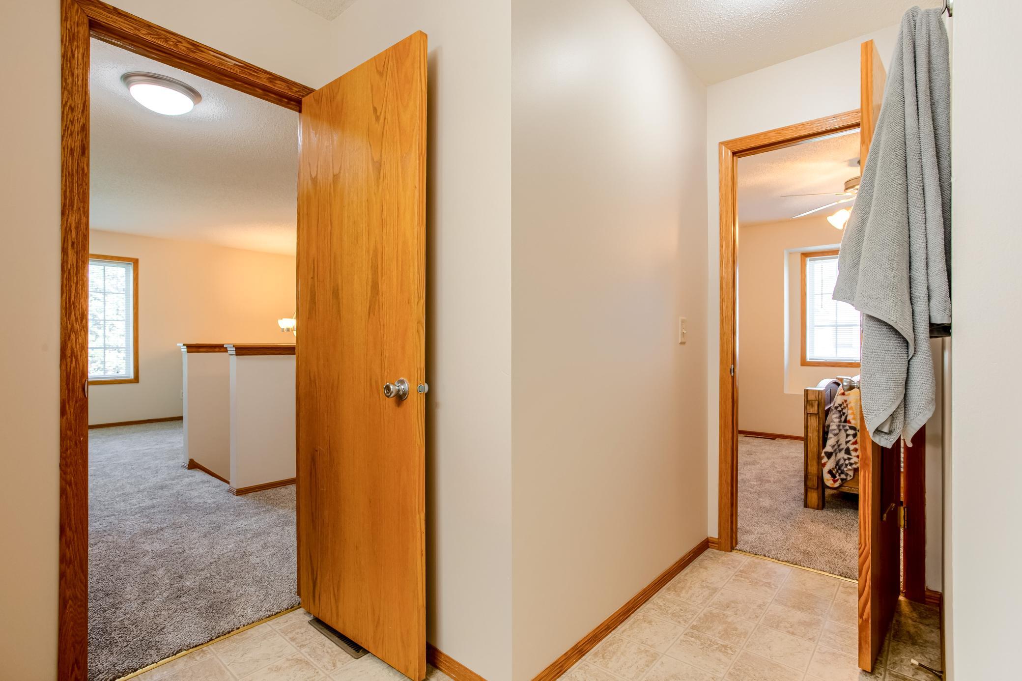 Another view of the walk-through layout, showcasing its convenient connection between the primary suite and loft area.