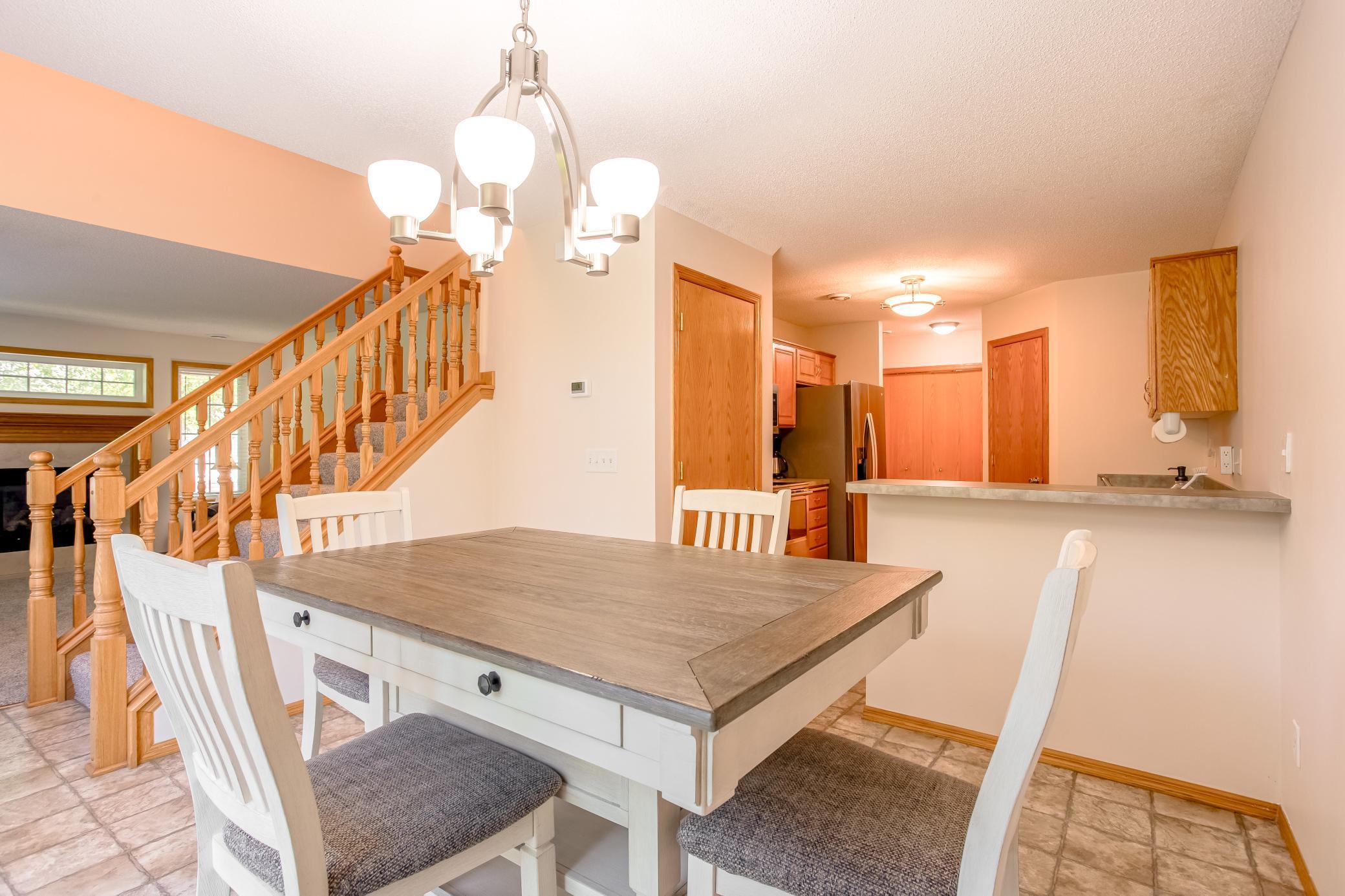 Open kitchen and dining layout creates a comfortable, connected space for everyday living and entertaining.