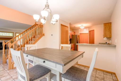 Open kitchen and dining layout creates a comfortable, connected space for everyday living and entertaining.