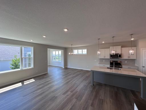 Kitchen, dining and morning room. Morning room has a beautiful pond view! a