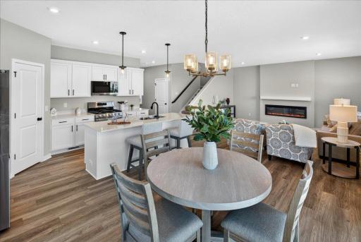 PHOTO OF A DIFFERENT HOME WITH SIMILAR PLAN & FINISHES.