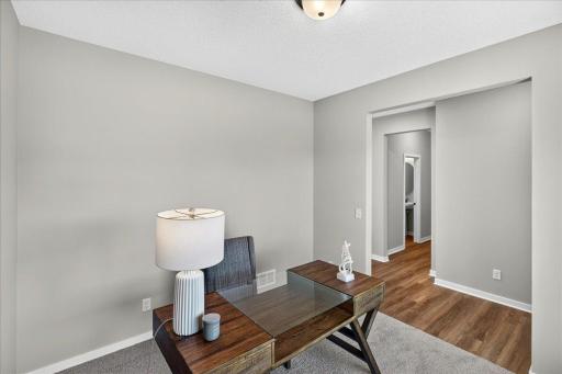 PHOTO OF A DIFFERENT HOME WITH SIMILAR PLAN & FINISHES. Flex Room.