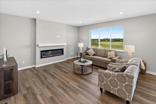 PHOTO OF A DIFFERENT HOME WITH SIMILAR PLAN & FINISHES.