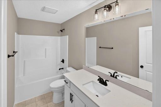 PHOTO OF A DIFFERENT HOME WITH SIMILAR PLAN & FINISHES. Upper Floor Main Full Bathroom.
