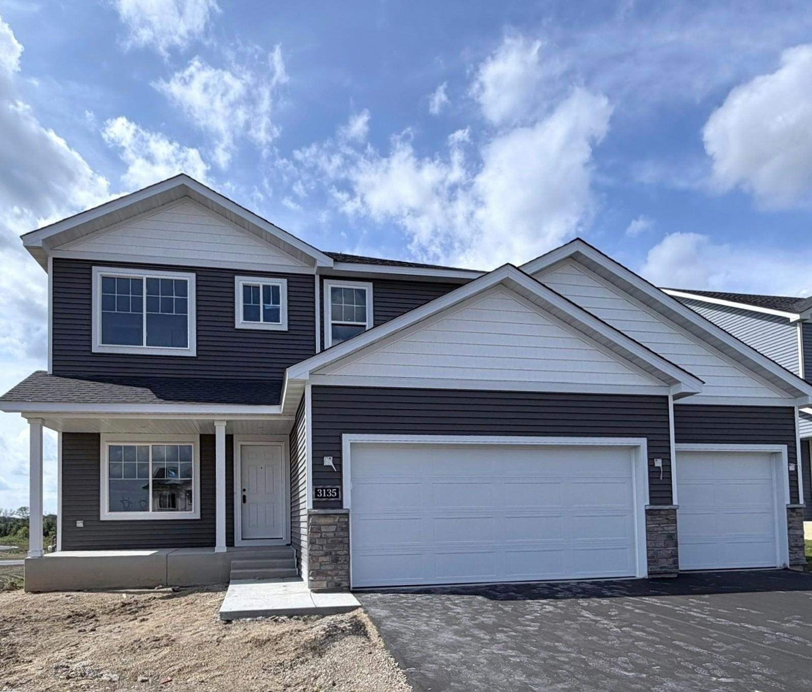 3135 Jandura Ave NE- New Construction Home will be ready for a September Move-in! Highlights include a 4 BAY GARAGE on a WALKOUT HOMESITE! Sod, Irrigation System, & Front Plantings included.