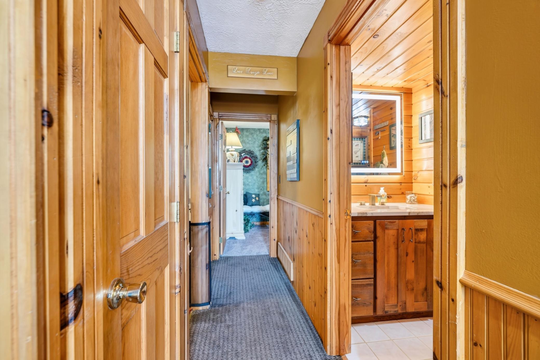 Hallway to the bath and main-level bedrooms.