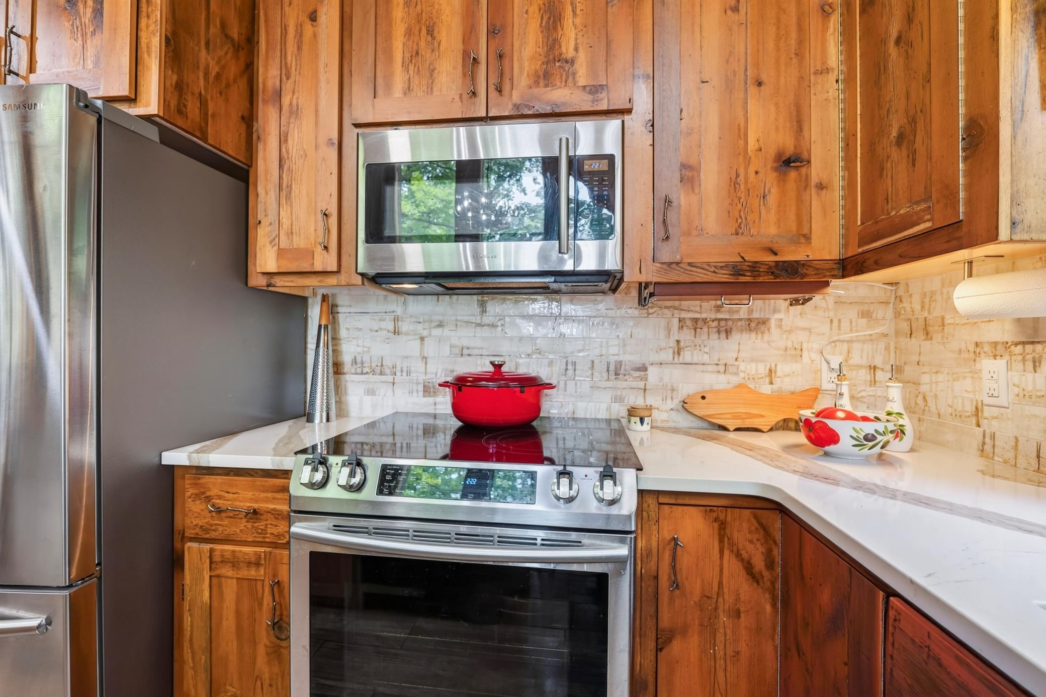 Stainless steel range & microwave.