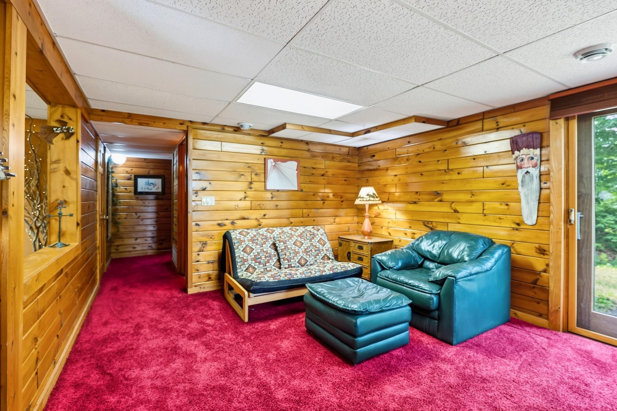Hallway to bath and lower level bedroom.