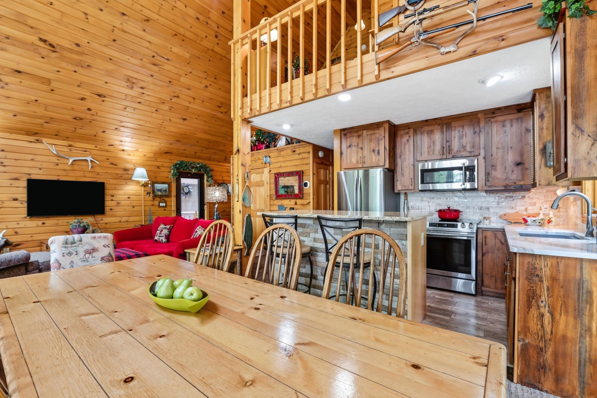 Kitchen opens to living spaces.
