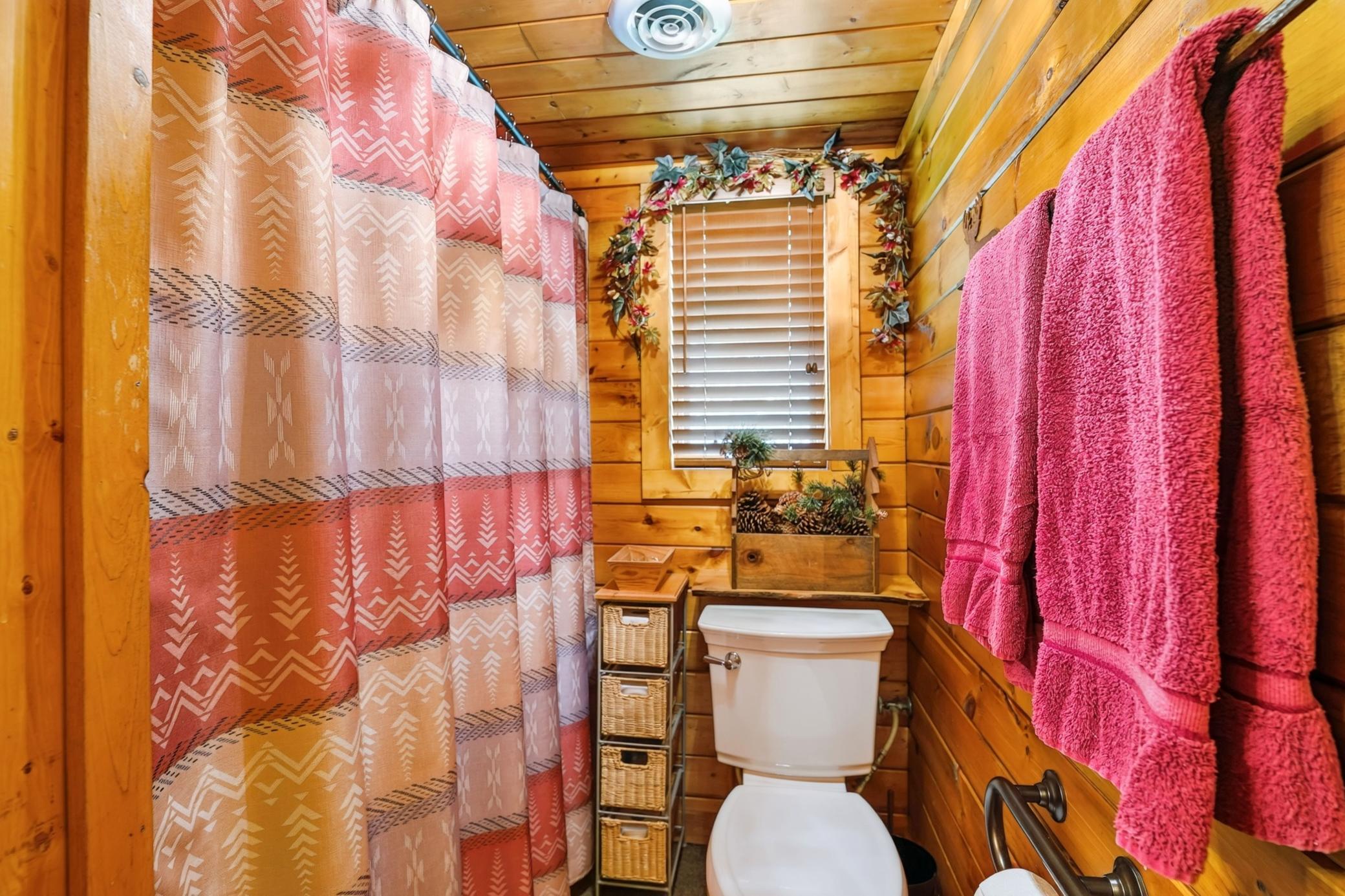 Shower area with a window.
