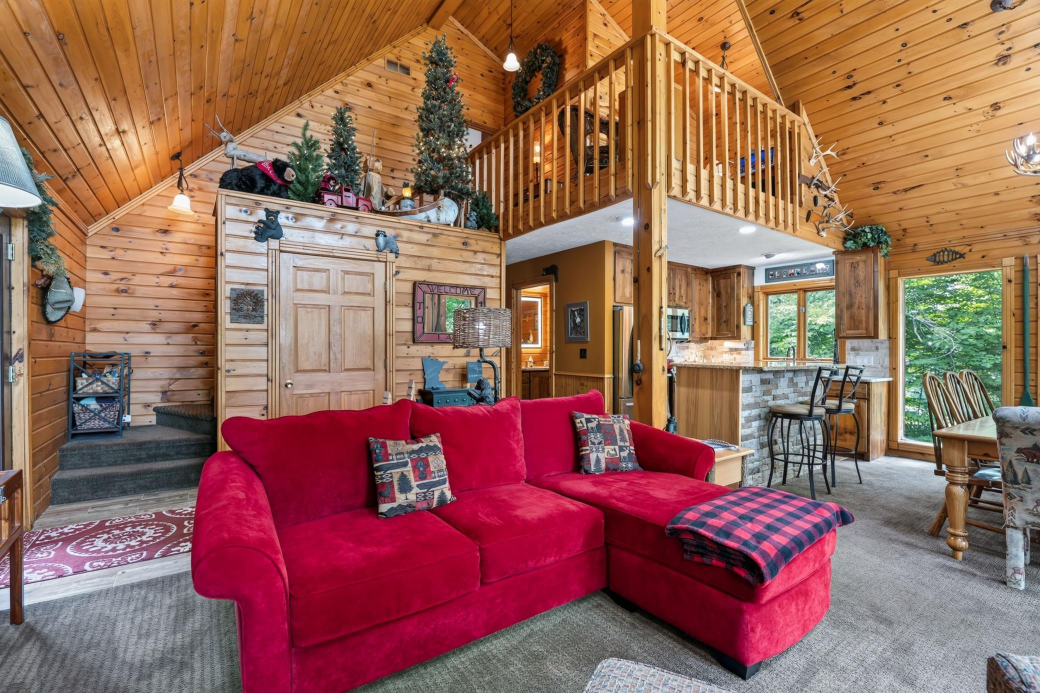 Open to kitchen & dining areas.