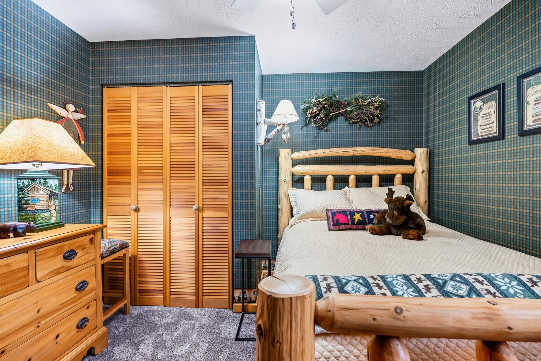Cozy guest bedroom with closet.