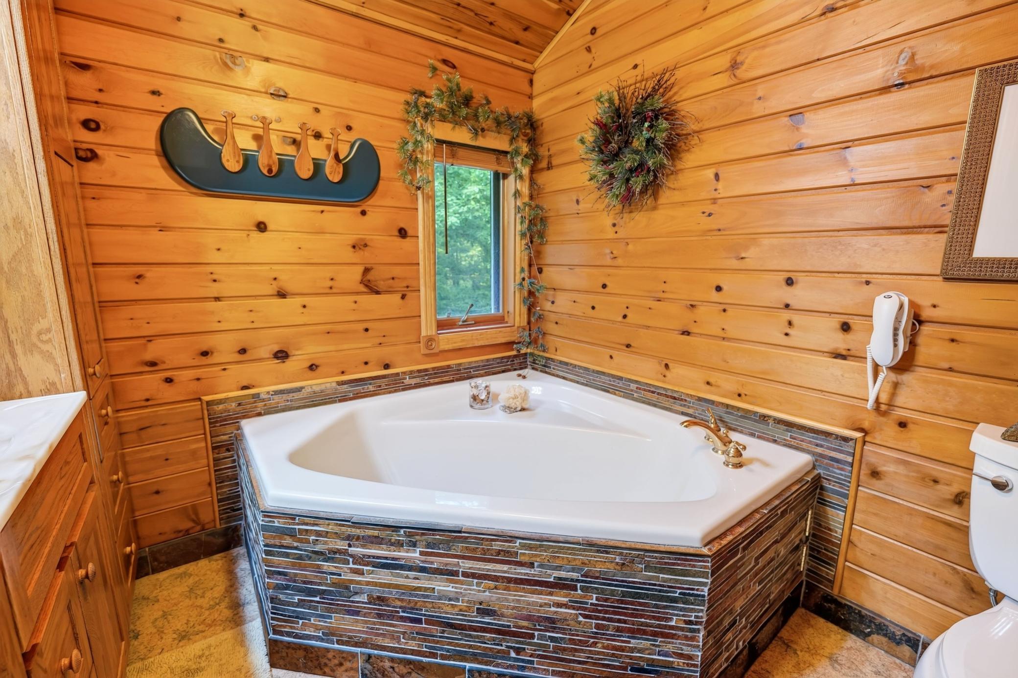 Tile surround soaking tub