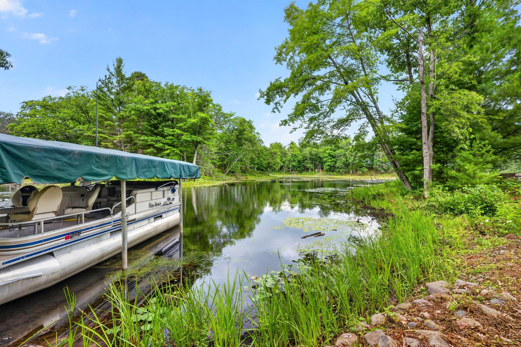 Picturesque cove with reflective calm waters.