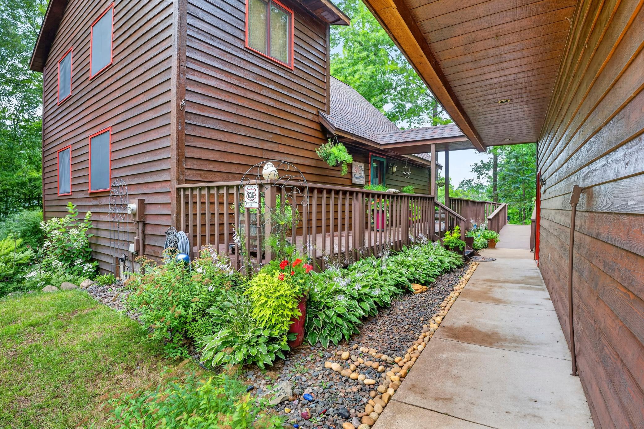 Sidewalk along the side of the garage.