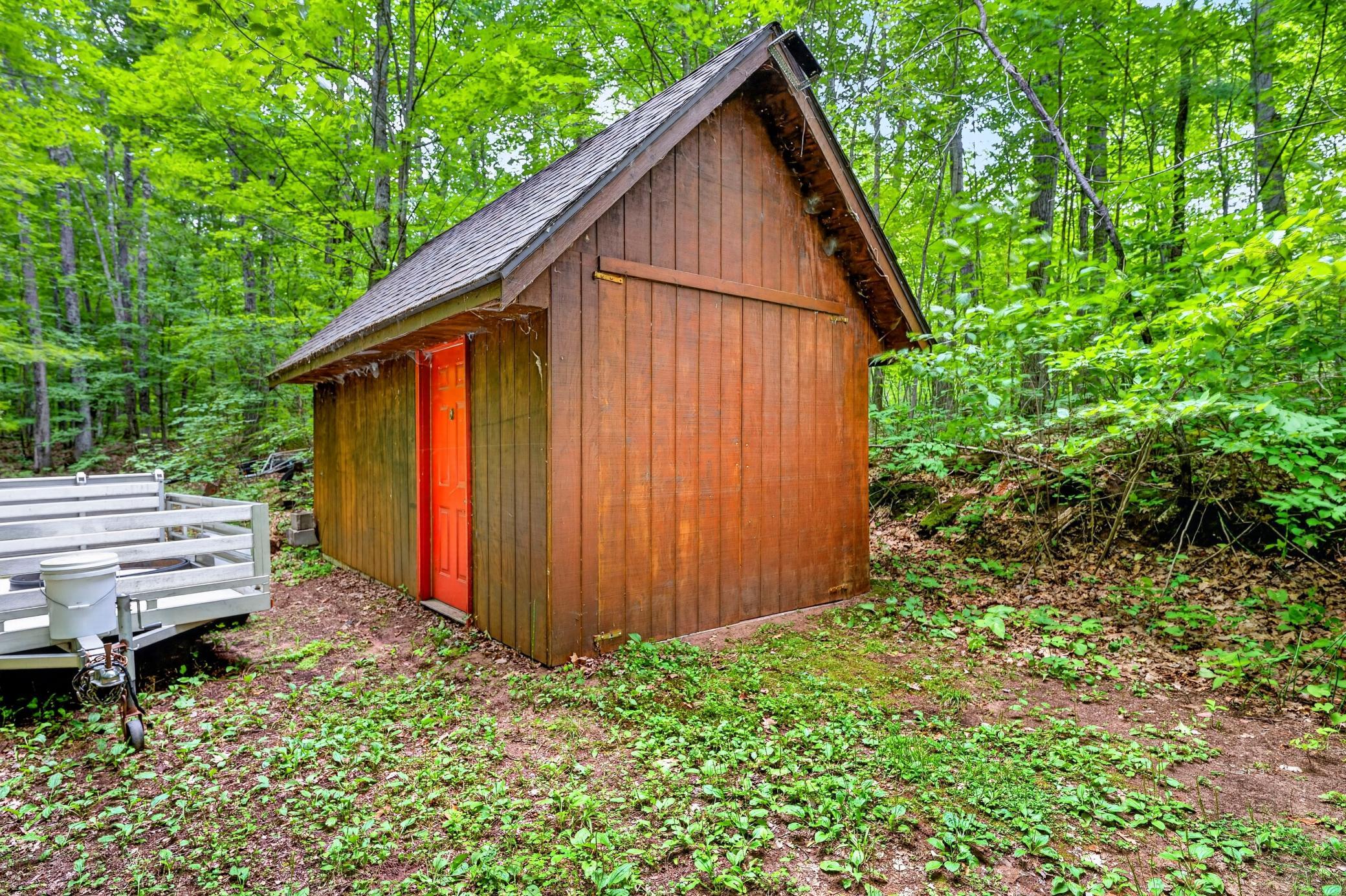 Large storage shed for yard equipment.