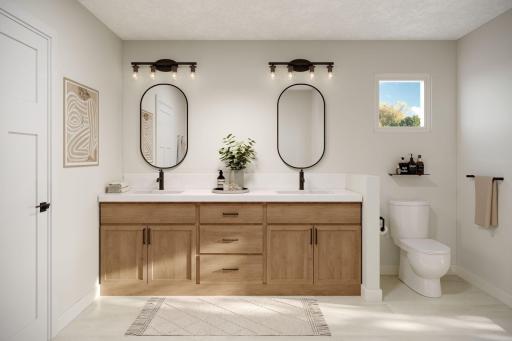 Owner's bathroom - virtually staged. Finishes in actual home are different. Picture used for floorplan purposes.