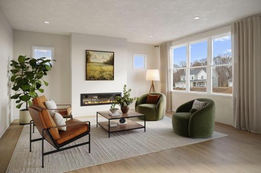 Family room - virtually staged. Finishes in actual home are different. Picture used for floorplan purposes.