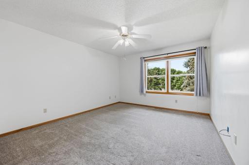 16x12 main floor primary bedroom. Newer windows.