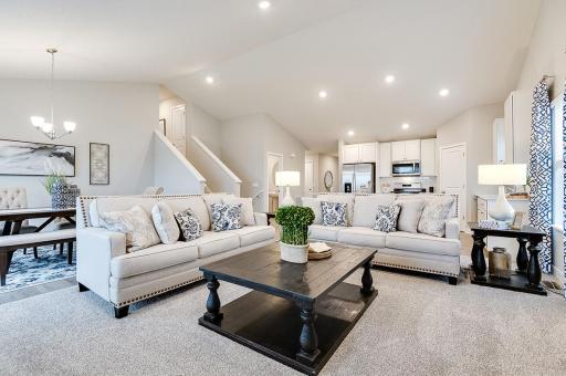 This massive cathedral vault hovers over the entire main level, equating in an openness rarely matched in new home design. Photo of model, colors and options will vary.