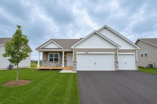 Photo for 17468 Dulles Lane, Lakeville, MN 55044 - listing #7116830 Welcome home to the Cameron II at Highlands at Eagle View in Elko New Market! Photo is of actual home. Options and colors may vary. Ask Sales Agent for details. AI-generated landscaping for visualization. Actual yard condition may differ.