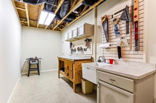 Lower level workshop with utility sink