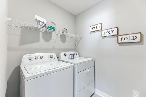Life's simple pleasures: Like upper level laundry! Photo of model home, colors and options may vary.