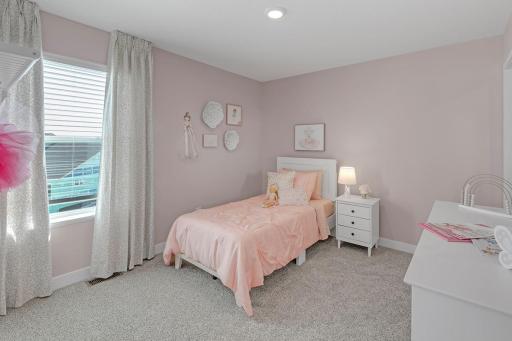 Each of the home's three additional bedrooms are also generously sized!