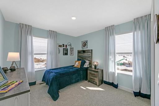 Each of the home's three additional bedrooms are also generously sized!