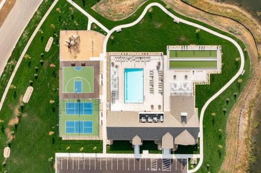 The clubhouse features a pool, fitness center, yoga studio, locker rooms, 2 pickleball courts, a basketball court, a playground, and lots of green space!