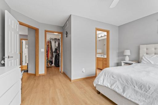 Upper primary bedroom with walk in closet and private full bath