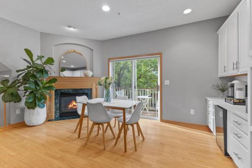 Cozy gas fireplace makes this space perfect for morning coffee or gatherings