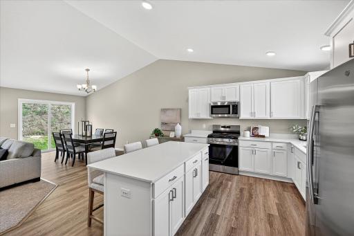 Kitchen - photo is of a previous inventory home. Inquire for more details and options.