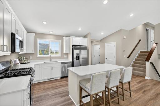 Kitchen - photo is of a previous inventory home. Inquire for more details and options.