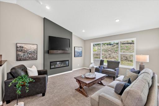 Living Room - photo is of a previous inventory home. Inquire for more details and options.