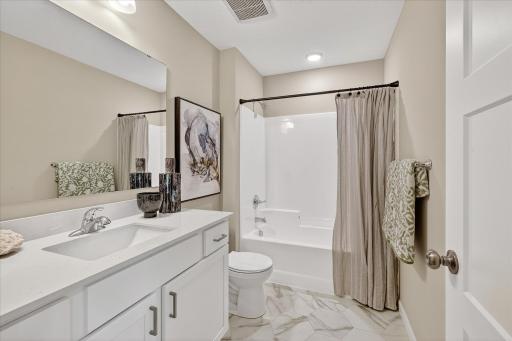 Main Bathroom - photo is of a previous inventory home. Inquire for more details and options.