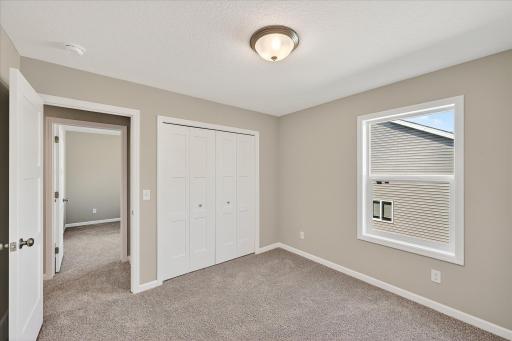 Bedroom 1 - photo is of a previous inventory home. Inquire for more details and options.