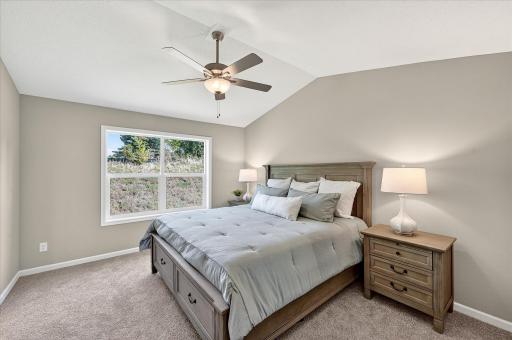 Primary Bedroom - photo is of a previous inventory home. Inquire for more details and options.
