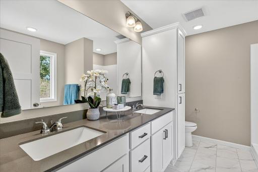 Primary Luxury Bath - photo is of a previous inventory home. Inquire for more details and options.